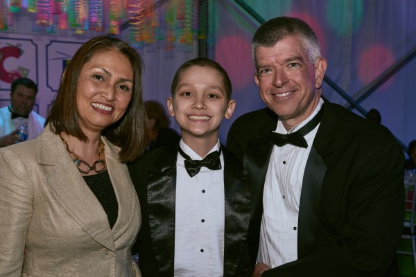 Akron Children's patient James Wilson (center) has performed at Carnegie Hall and wowed the guests with his piano performance. James is pictured with his mother, Noriko, and Dr. Jeffrey Hord.