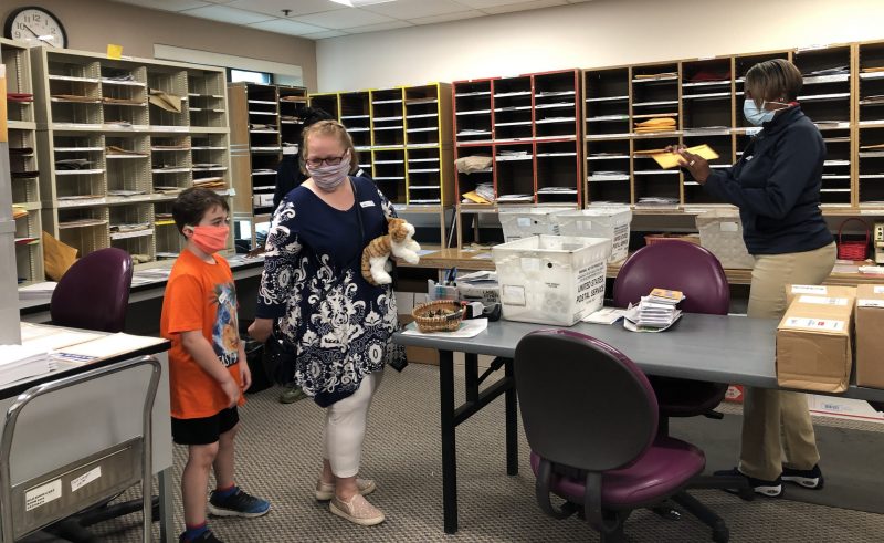 Surprise mailroom visit earns stamp of approval from boy & his mom